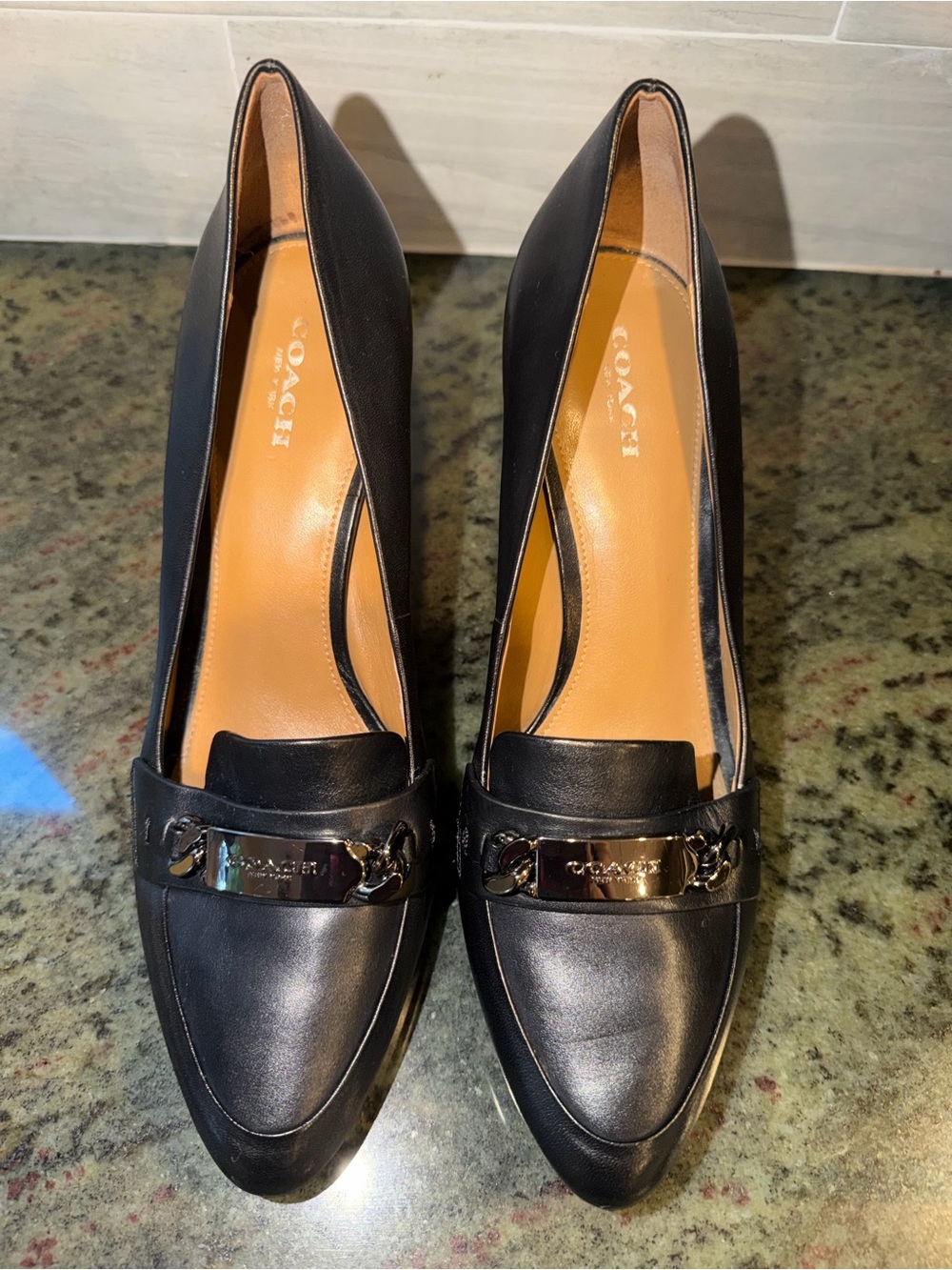 Coach Black Leather Pointed Loafers with Gold-Tone Plaque